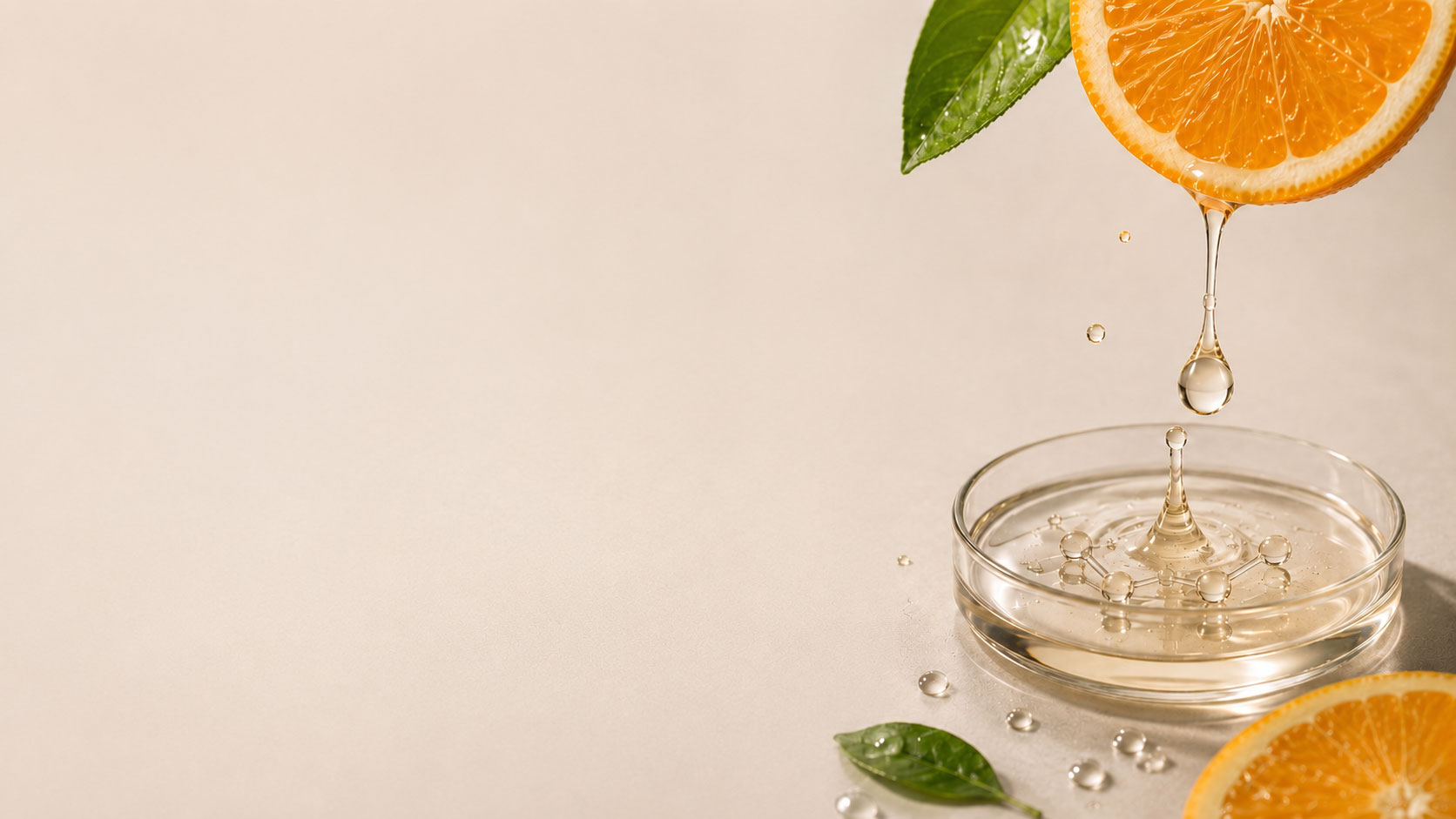 Vitamin C serum dripping from an orange into a glass dish